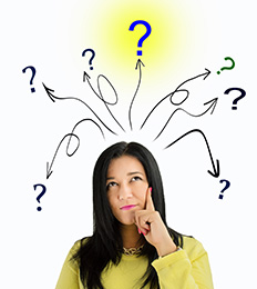 Thinking woman with question marks above her head